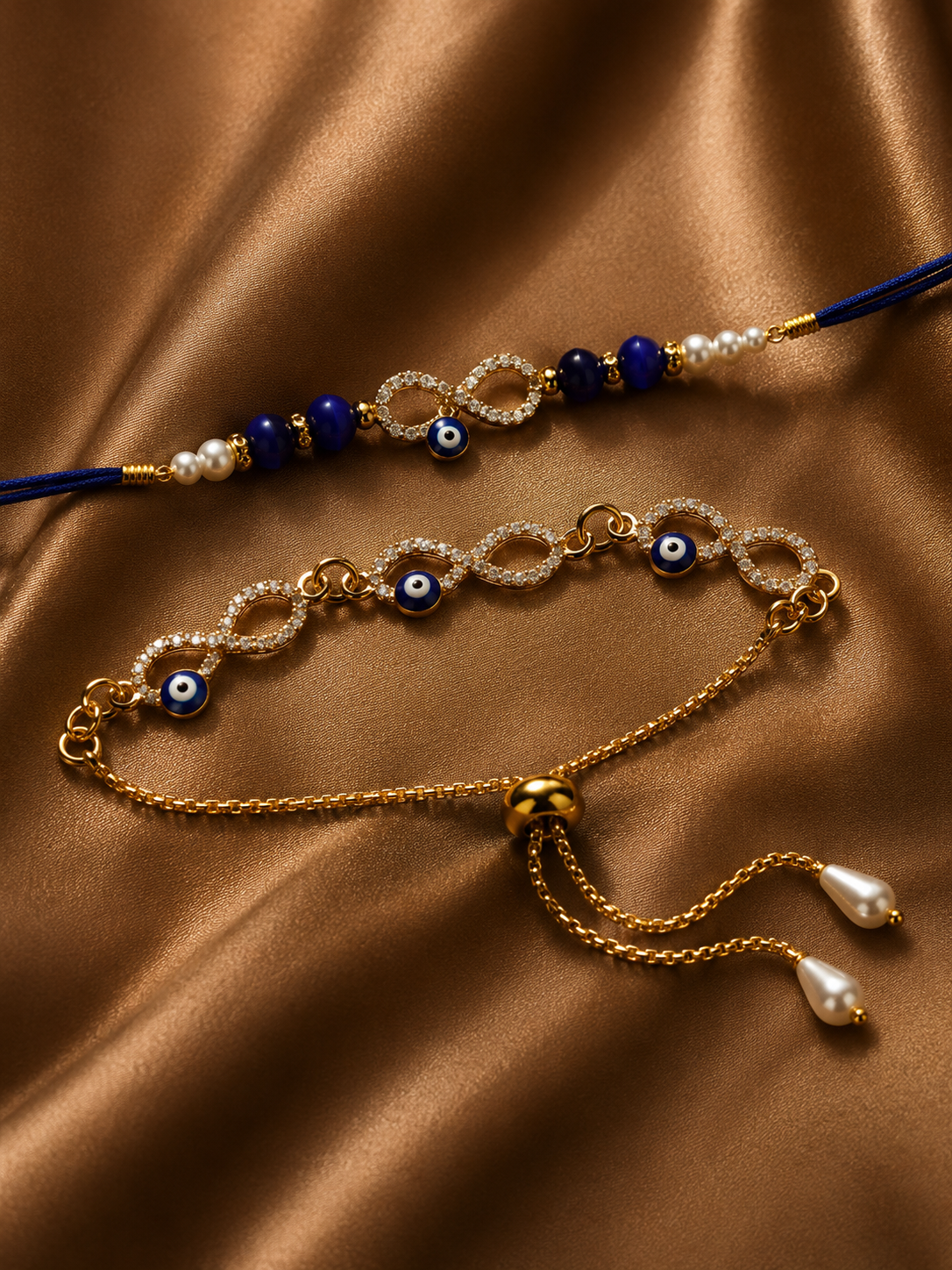 Elegant Evil Eye Rakhi Set For Bhaiya And Bhabhi (2 Pcs)